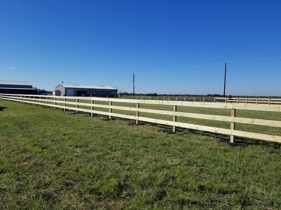 White board fence with pasture Brookshire TX